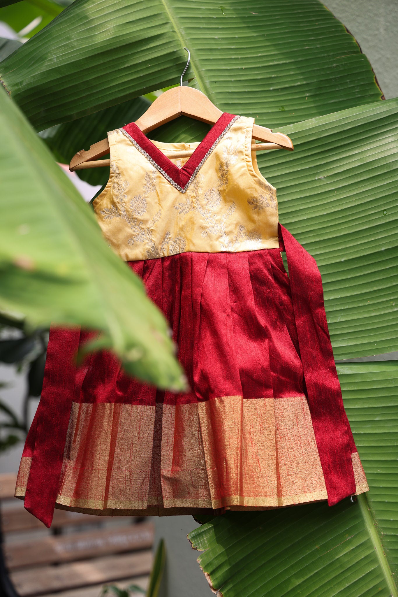 Silk maroon colour border frock V neck sleeveless